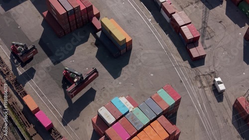 Shipping Container Yard Aerial View: An aerial perspective showcases a bustling shipping container yard.