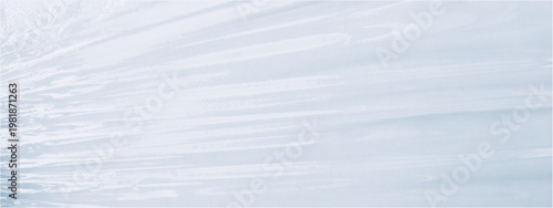 A crumpled, wrinkled piece of cellophane. A stretched wrinkled plastic film texture with dotted halftone effect. Crinkled oilcloth background with soft folds and transparent material look for package.