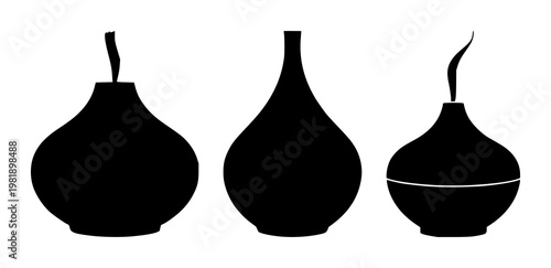 Aromatherapy oil diffuser set with solid black icon on a white background featuring aromatherapy, oil diffuser, icon with black and white and vector illustration