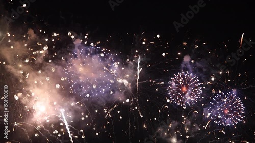 Amazing real beautiful colorful fireworks background on celebration night event for happy new year party, independence day, festivals, Abstract Multi color golden firework in the night sky