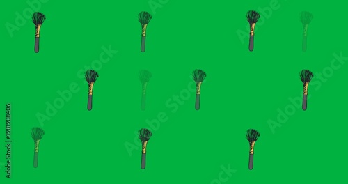 Digital animation of multiple makeup brush icons against black background