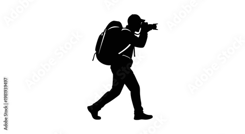 Man walking with camera equipment.