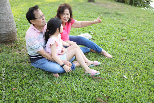 Grandparents and Granddaughter in the Park