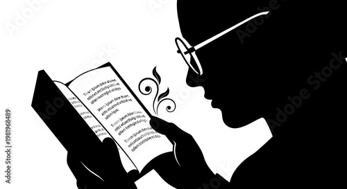 Person reading book with glasses on.