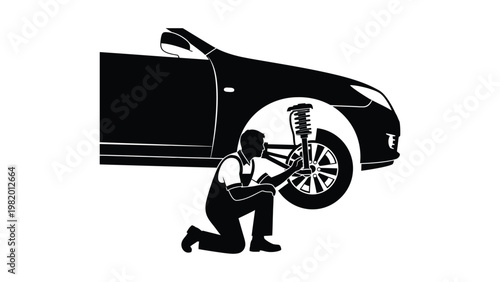 Mechanic changing a car tire.