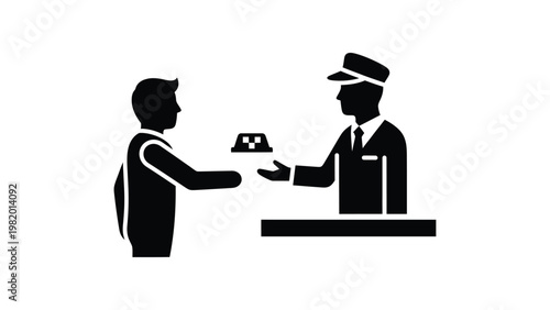 Man receiving a ticket from an attendant.