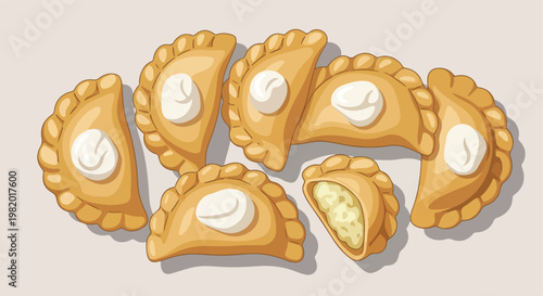 A collection of golden pan-fried dumplings topped with dollops of sour cream