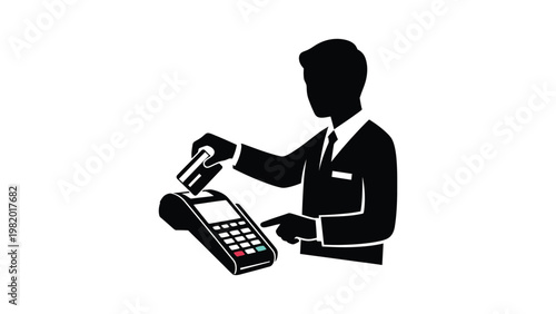 Man in a suit using a payment terminal.