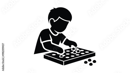 boy playing with puzzle pieces on table.