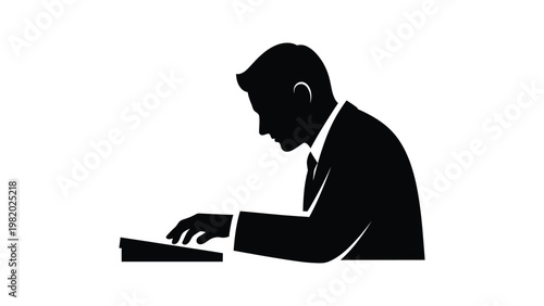 Businessman working on laptop computer.