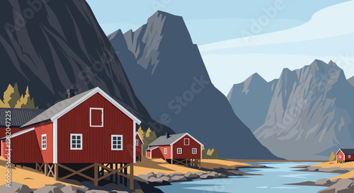Traditional red wooden houses on the coast of a scenic norwegian fjord with majestic mountains in a beautiful northern landscape under a clear sky.