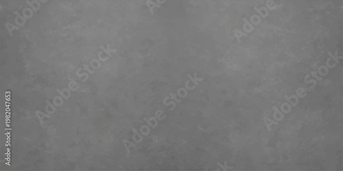 Abstract a textured stone wall, its surface weathered and aged, exhibiting a spectrum of grey hues.  The rough texture reveals the passage of time and the strength of nature.