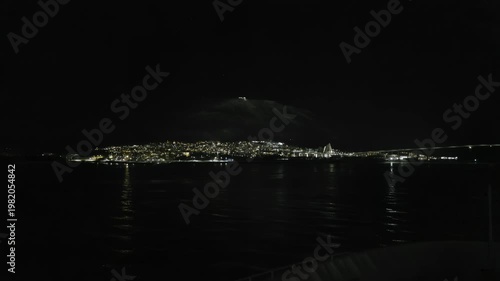 Sailing into Tromsø at night