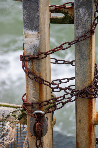 A close up view of a locked and chain 