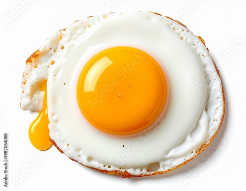 Golden yolk fried egg with crispy edges isolated