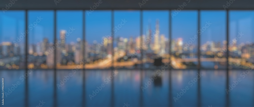 Fototapeta premium Panoramic Night Cityscape View Through Modern Glass Window.