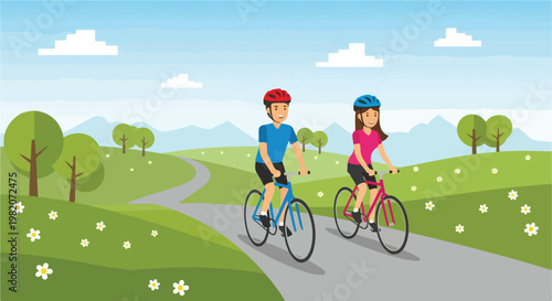 A man and woman wearing helmets cycle together on a scenic path in the park