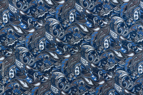 Navy paisley pattern fabric background