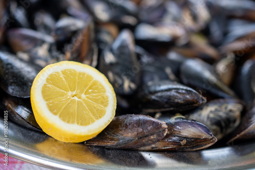 Fresh Mussels with Lemon Slices Background Seafood Texture
