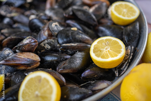 Fresh Mussels with Lemon Slices Background Seafood Texture