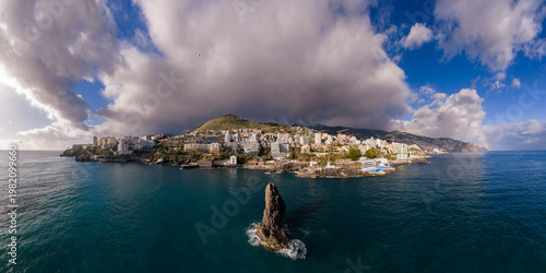 São Martinho coast and ocean pools, São Martinho Funchal Madeira Portugal seaside district with Atlantic waterfront and resort skyline.