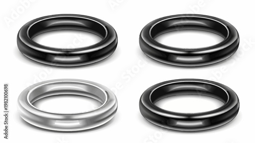 Four rings, one silver, three black, cast shadows on a stark white background