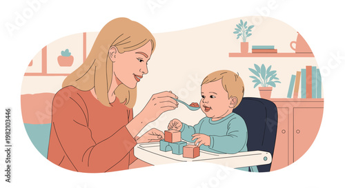 Young mother patiently feeds her baby sitting in a high chair with a spoon while the infant plays with colorful blocks.