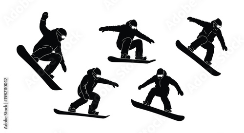 Silhouetted snowboarders performing tricks in mid air dynamic action poses