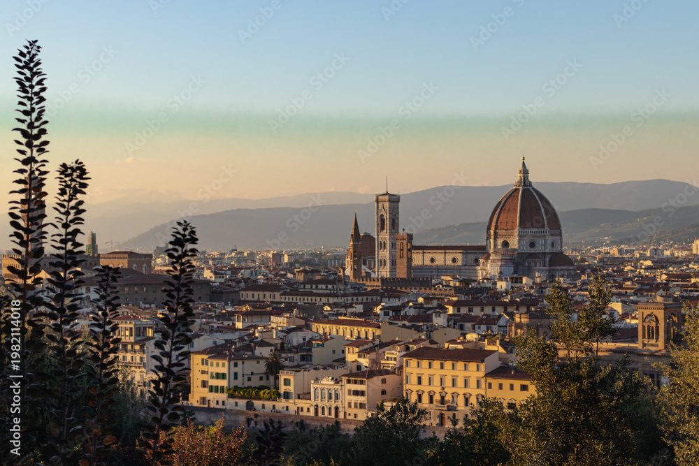 Naklejka premium Panoramic View of Florence Cityscape with Duomo at Golden Hour