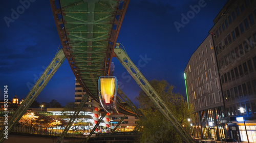 фотографія Wuppertal bey night - fast suspension railway, North Rhine-Westphalia, Germany