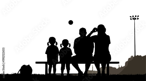 Family Silhouette Watching Game Together on Bench at Sunset with Ball in Air
