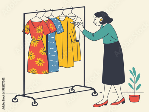 Woman considering colorful dresses on a mobile clothing rack