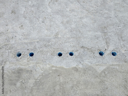 Canvastavla Holes are drilled in the concrete floor to allow water to flow into them