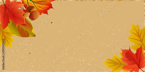 Autumn leaves and acorns arranged on a textured beige background