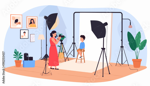 Woman photographing a young boy studio.