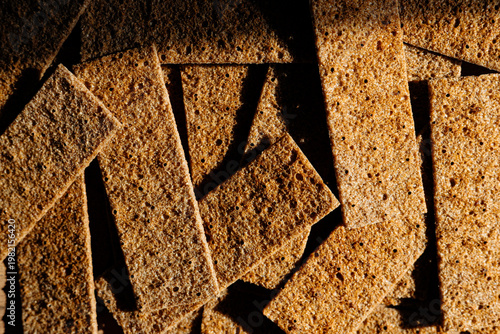 Crunchy rye crispbread snack arrangement in sunlight