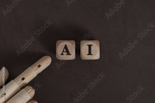 Artificial Intelligence Concept with wooden mannequin hand