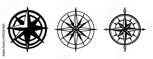 Compass rose set with black silhouette design featuring directional points, compass needle, ornamental lines with navigation and travel