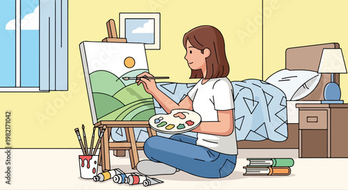 A woman sits on the floor in her bedroom painting a landscape on an easel