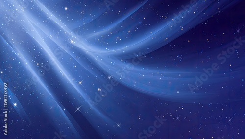 A mesmerizing abstract image showcases flowing blue light trails against a deep blue starry background, creating a sense of cosmic wonder and ethereal beauty.