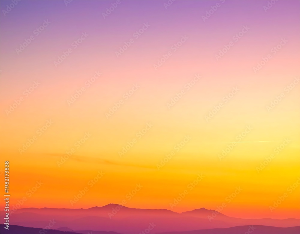 Fototapeta premium Vibrant sunrise over distant mountains with colorful sky and serene landscape