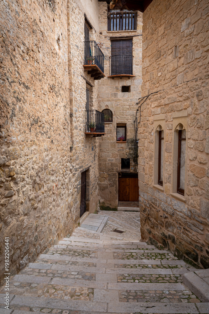 Fototapeta premium Vertical photo of a typical street in the historic center of Valderrobres, Teruel, Aragon, Spain