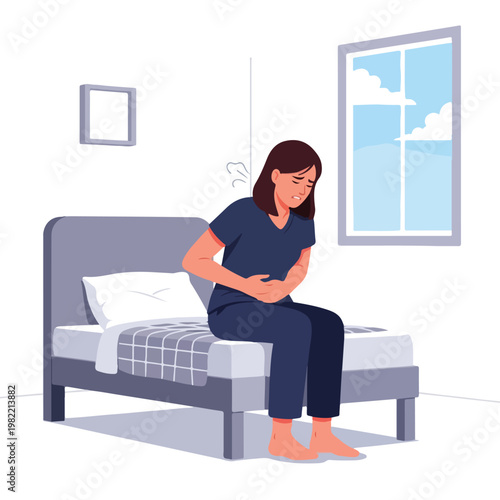 Woman sitting on bed clutching her stomach in acute pain from cramps or sickness
