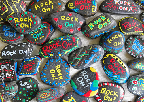 Pocket size painted rocks on display