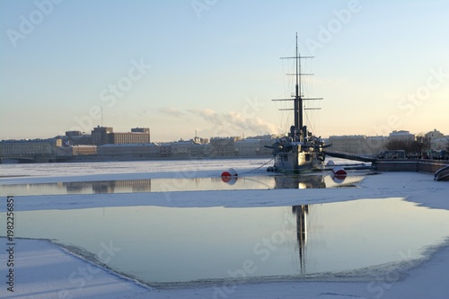 The cruiser Aurora on the frozen Neva River in St. Petersburg