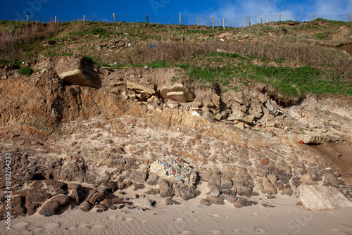 Obraz na plátně Crumbling cliff faces of erosion on East Yorkshire Coast on one of the fastest e