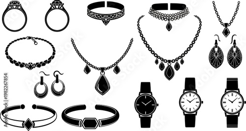 collection of black and white jewelry and watches on white background