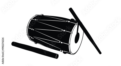Black and white image of a drum with two drumsticks