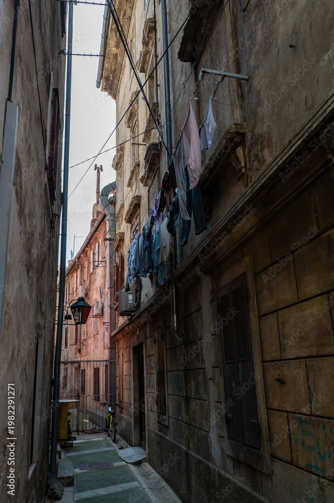 Fototapeta premium Narrow alley in the Croatian old town of Senj