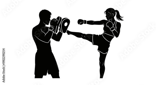 Female kickboxer practicing with a male trainer.